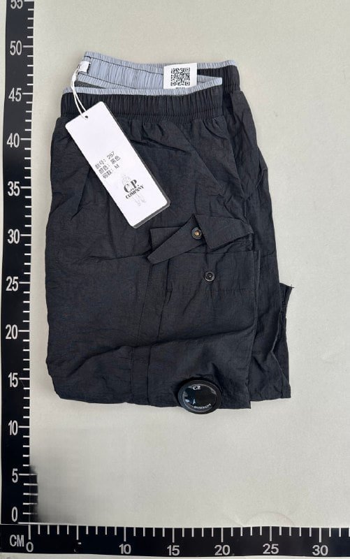 pantalones cortos cp company